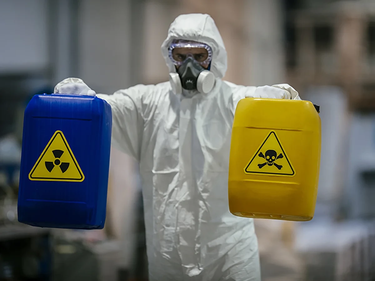 Biohazard cleanup technicians in protective equipment at a remediation scene in Arlington, WA